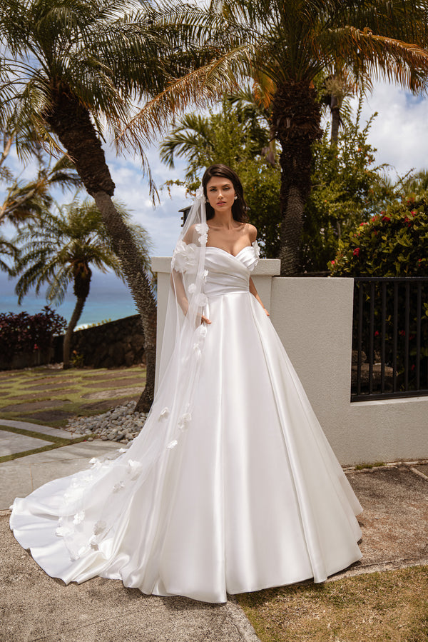 Refined Wedding Dress with Open Shoulders, Short Sleeves, Gorgeous Skirt Train, Unusual Waist Corset, and Decorative Flowers Embroidered with Pearls