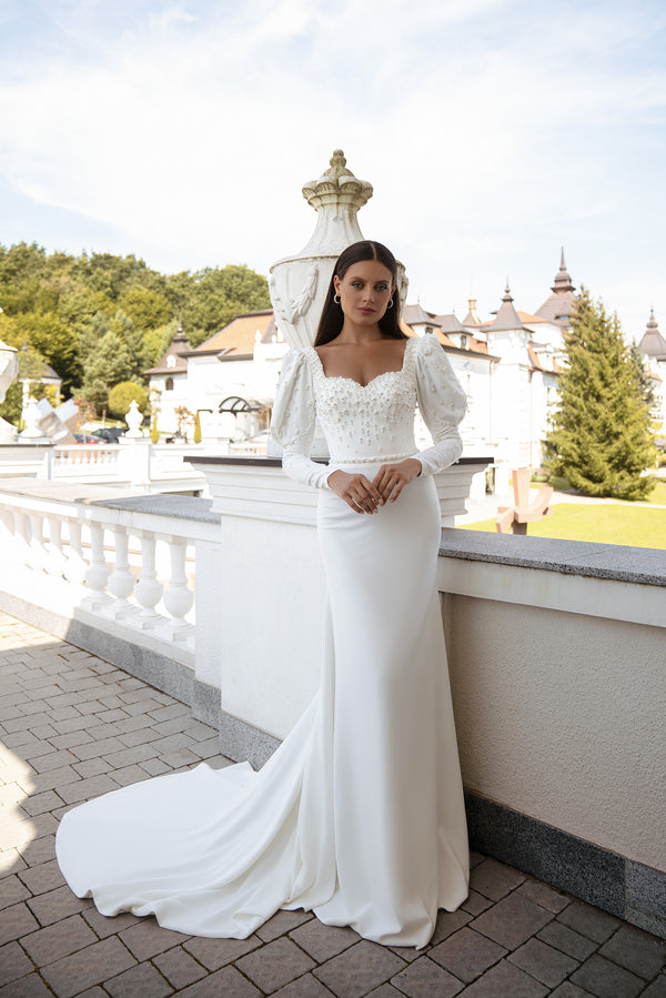 Elegant Minimalist Wedding Dress with Godet Silhouette, Long Sleeves, Train, and Crystal & Pearl Embroidery