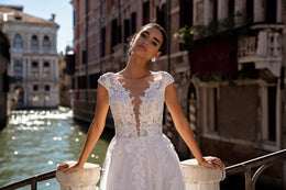 A-Line Lace Wedding Dress with Cap Sleeves and V-Neck