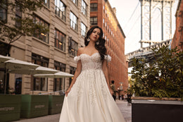 Off-Shoulder Ball Gown Wedding Dress with Floral Appliqués