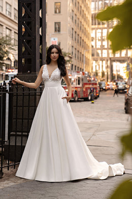 Deep V-Neck A-Line Wedding Dress with Lace Bodice and Pockets