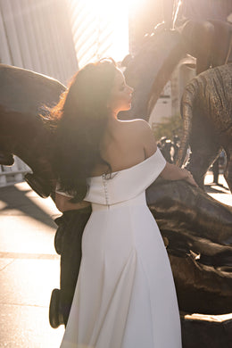 Minimalist Off-the-Shoulder A-Line Wedding Dress with Chapel Train