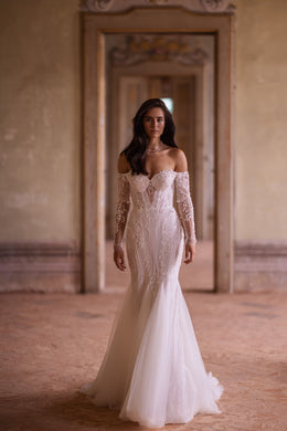 Ivory mermaid wedding dress with off-the-shoulder lace sleeves, floral appliqués, and a sweeping train