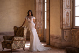 Mermaid Bridal Gown with Deep V-Neck, 3D Lace, Detachable Skirt, and Buttons Back