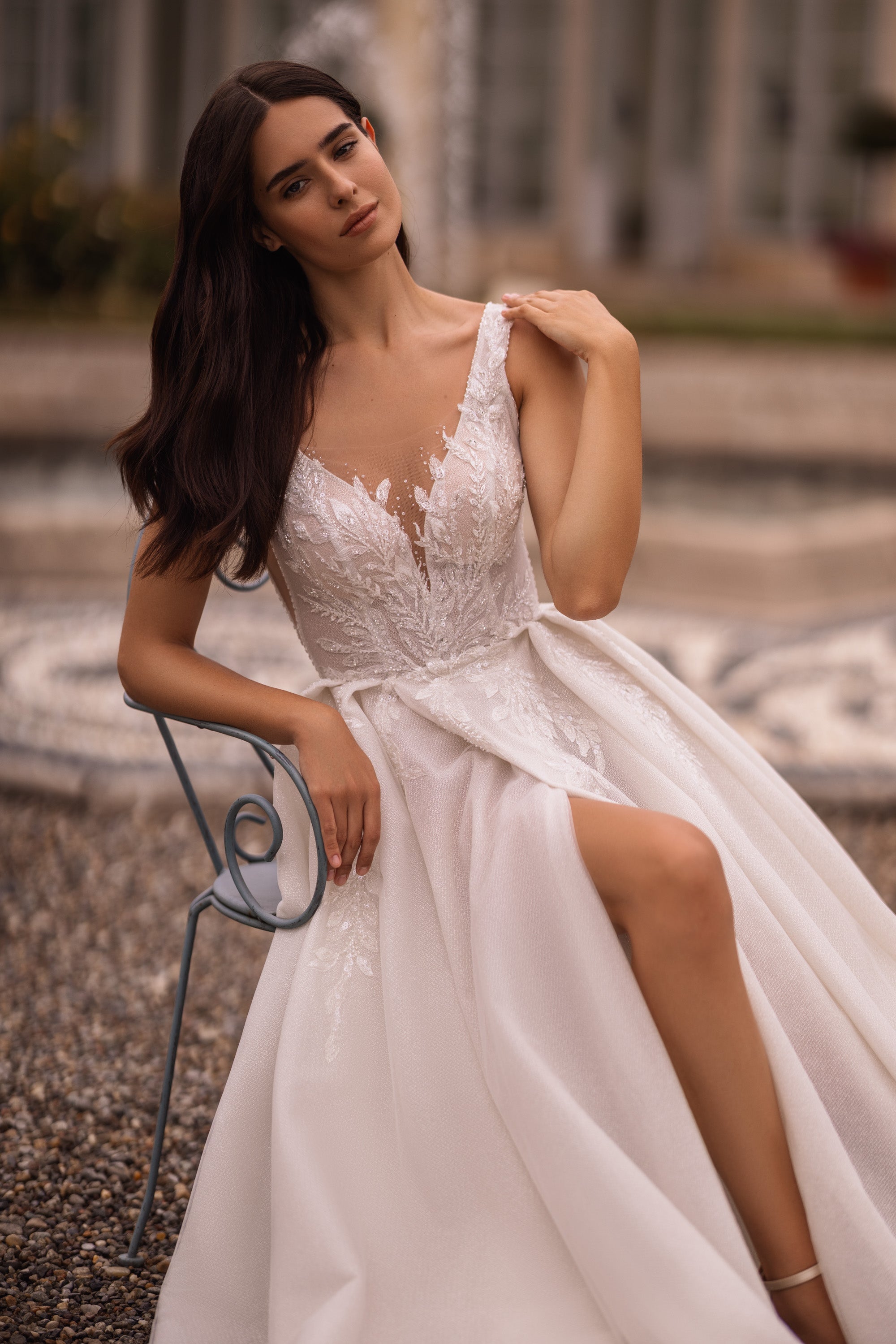 Elegant A-Line Wedding Gown with V-Neck, Straps, Slit Skirt, Lace, and Train