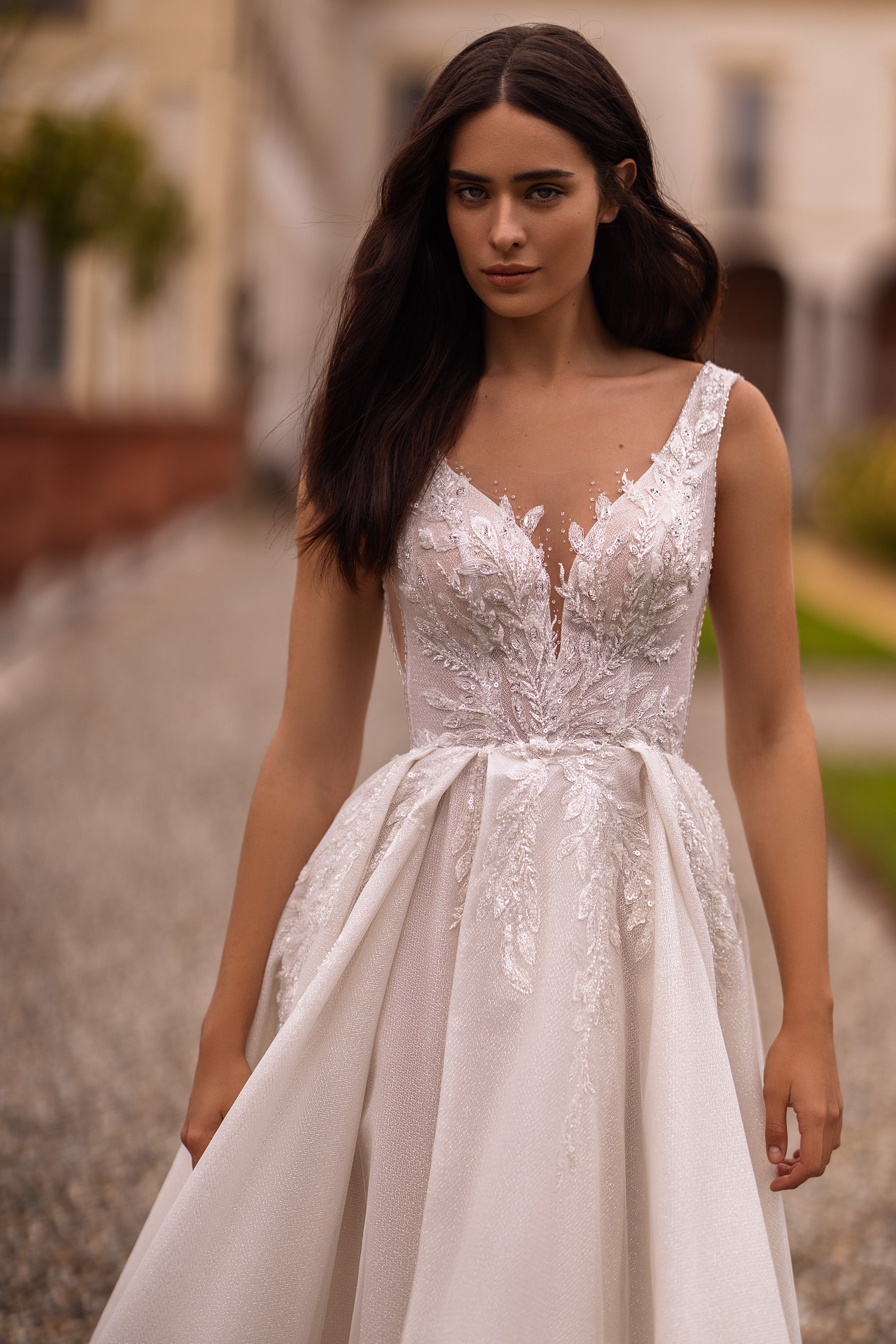 Elegant A-Line Wedding Gown with V-Neck, Straps, Slit Skirt, Lace, and Train