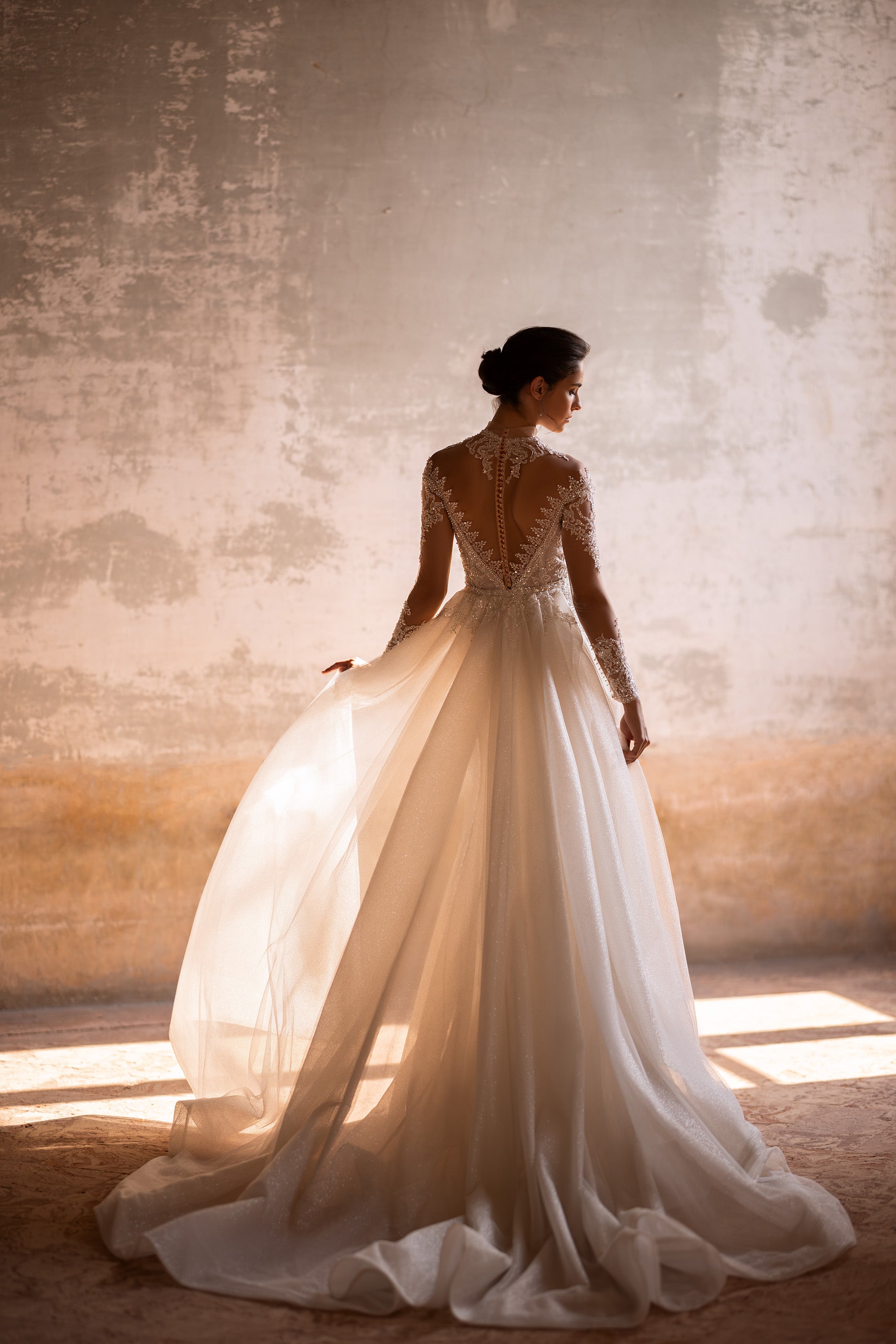 Elegant Bridal Gown Mermaid with Long Sleeves, High Neck, Lace Back, and Additional Skirt