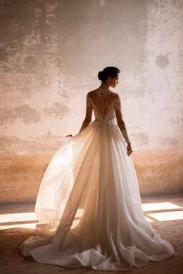 Elegant Bridal Gown Mermaid with Long Sleeves, High Neck, Lace Back, and Additional Skirt
