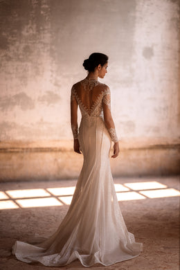 Elegant Bridal Gown Mermaid with Long Sleeves, High Neck, Lace Back, and Additional Skirt