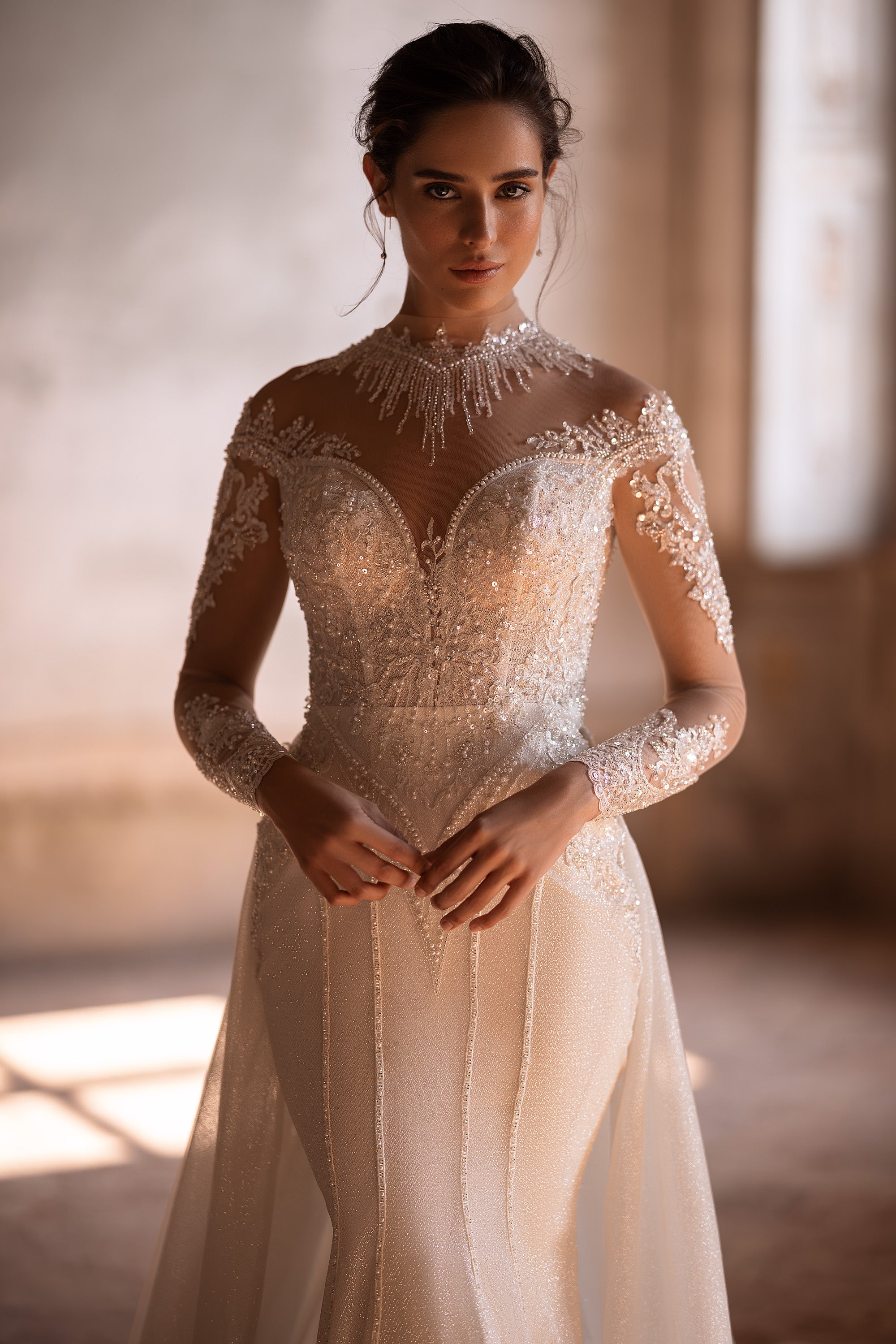 Elegant Bridal Gown Mermaid with Long Sleeves, High Neck, Lace Back, and Additional Skirt