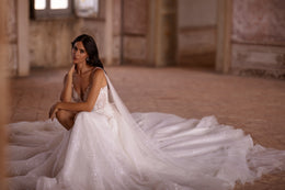 Spaghetti Straps Bridal Gown Beach Wedding Dress with Slit Skirt, Detachable Wings, and Deep V-Neck