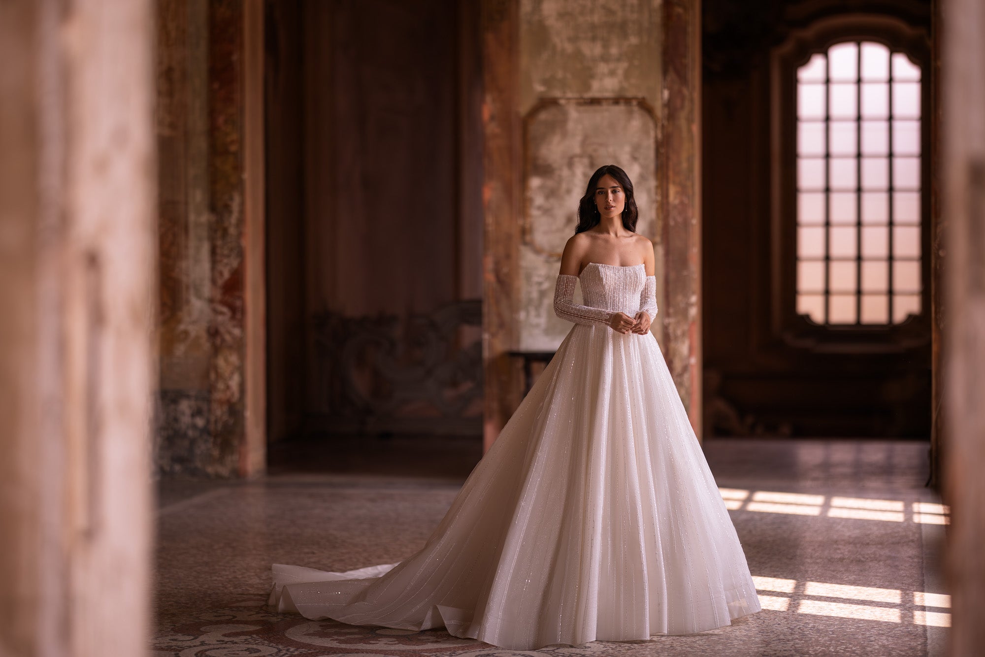 Elegant Lace Ballgown Wedding Dress with Straight Neckline, Additional Long Sleeves, and Cathedral Train