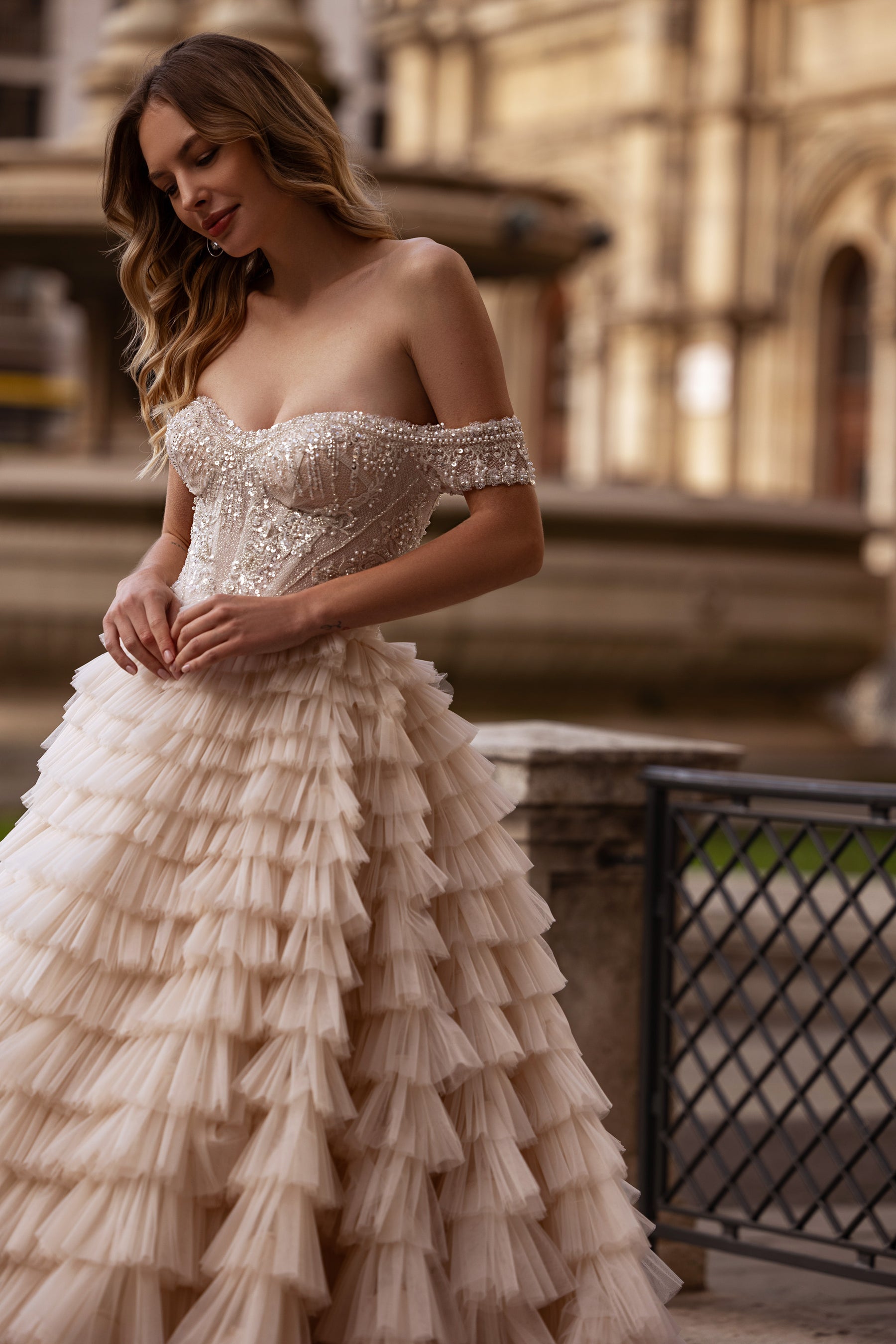Ball Gown Wedding Dress With Off-The-Shoulder Neckline Tiered Tulle Skirt Beading And Crystals Cathedral Train