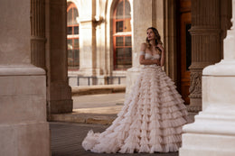 Ball Gown Wedding Dress With Off-The-Shoulder Neckline Tiered Tulle Skirt Beading And Crystals Cathedral Train