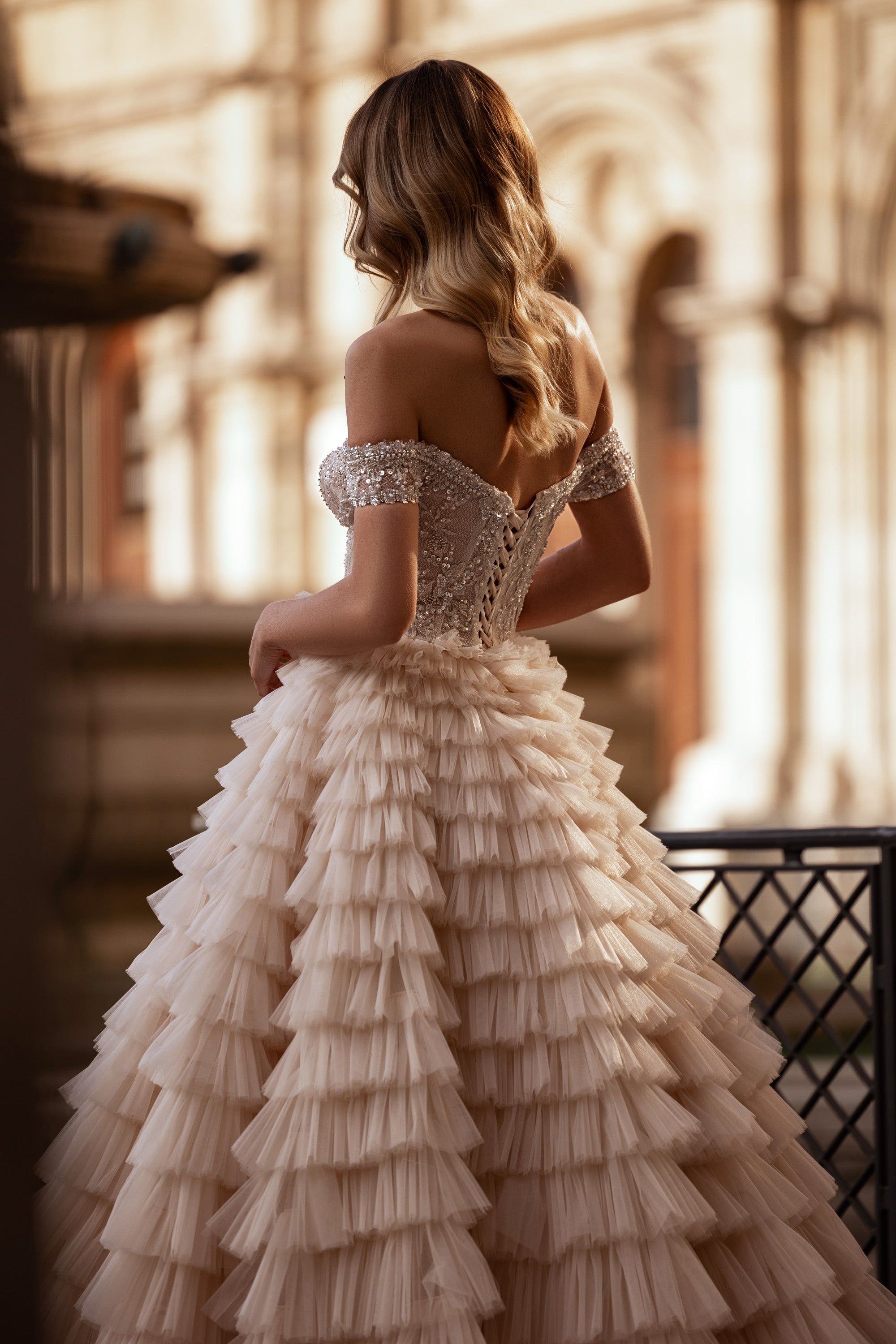 Ball Gown Wedding Dress With Off-The-Shoulder Neckline Tiered Tulle Skirt Beading And Crystals Cathedral Train