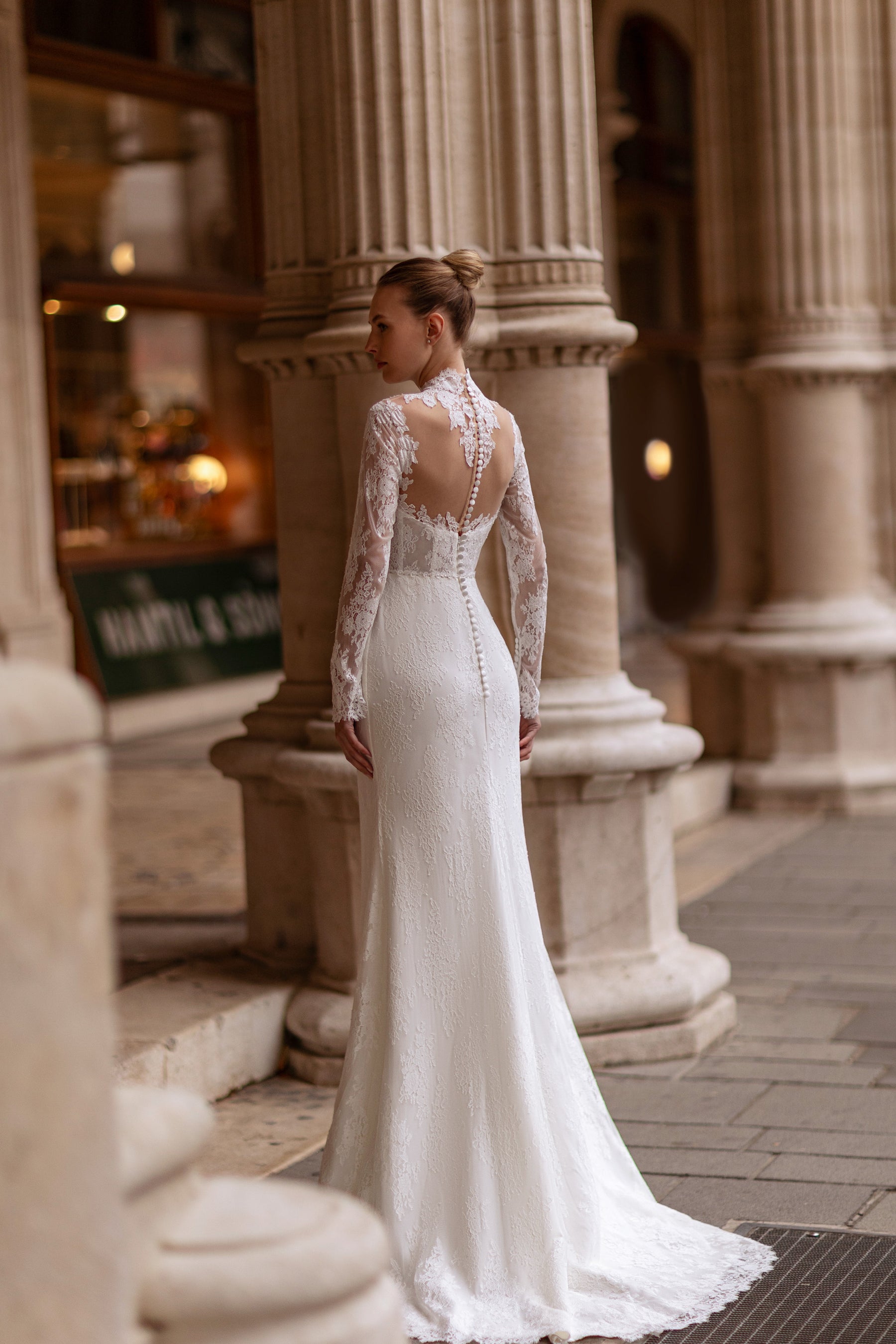 Ball Gown Wedding Dress with Lace Appliqués, Illusion High Neckline, Long Sleeves, Tulle Skirt and Cathedral Train