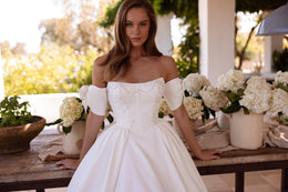 Bardot Ball Gown Wedding Dress with Beaded Bodice and Bow Sleeves