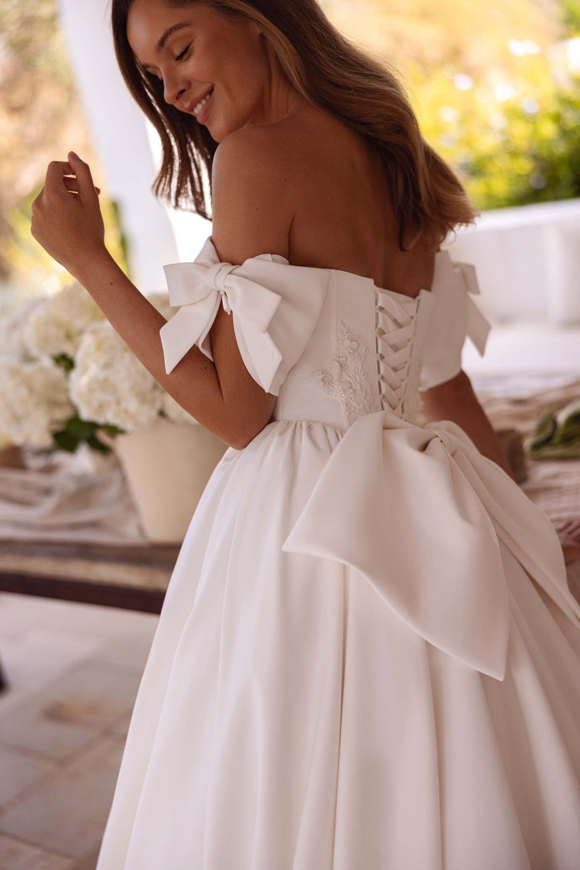 Bardot Ball Gown Wedding Dress with Beaded Bodice and Bow Sleeves