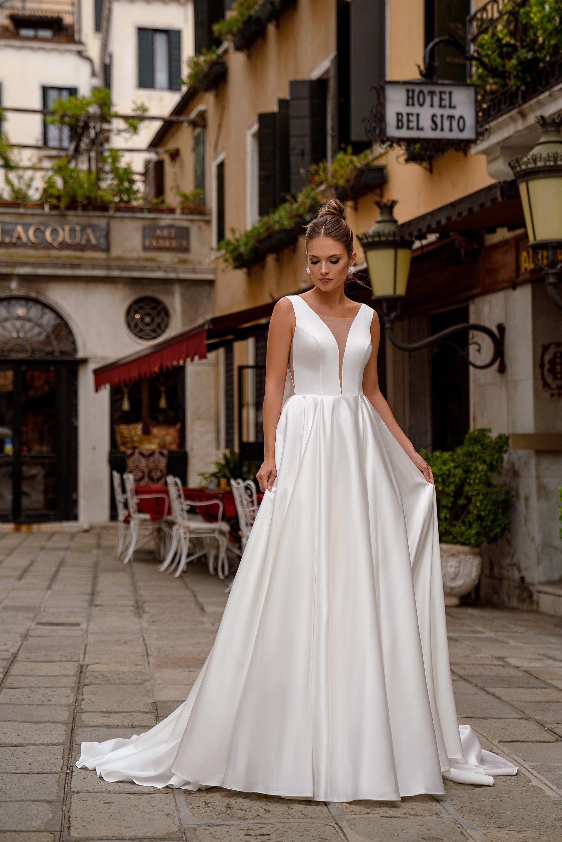Ball Gown Wedding Dress with Deep V-Neck and Statement Bow