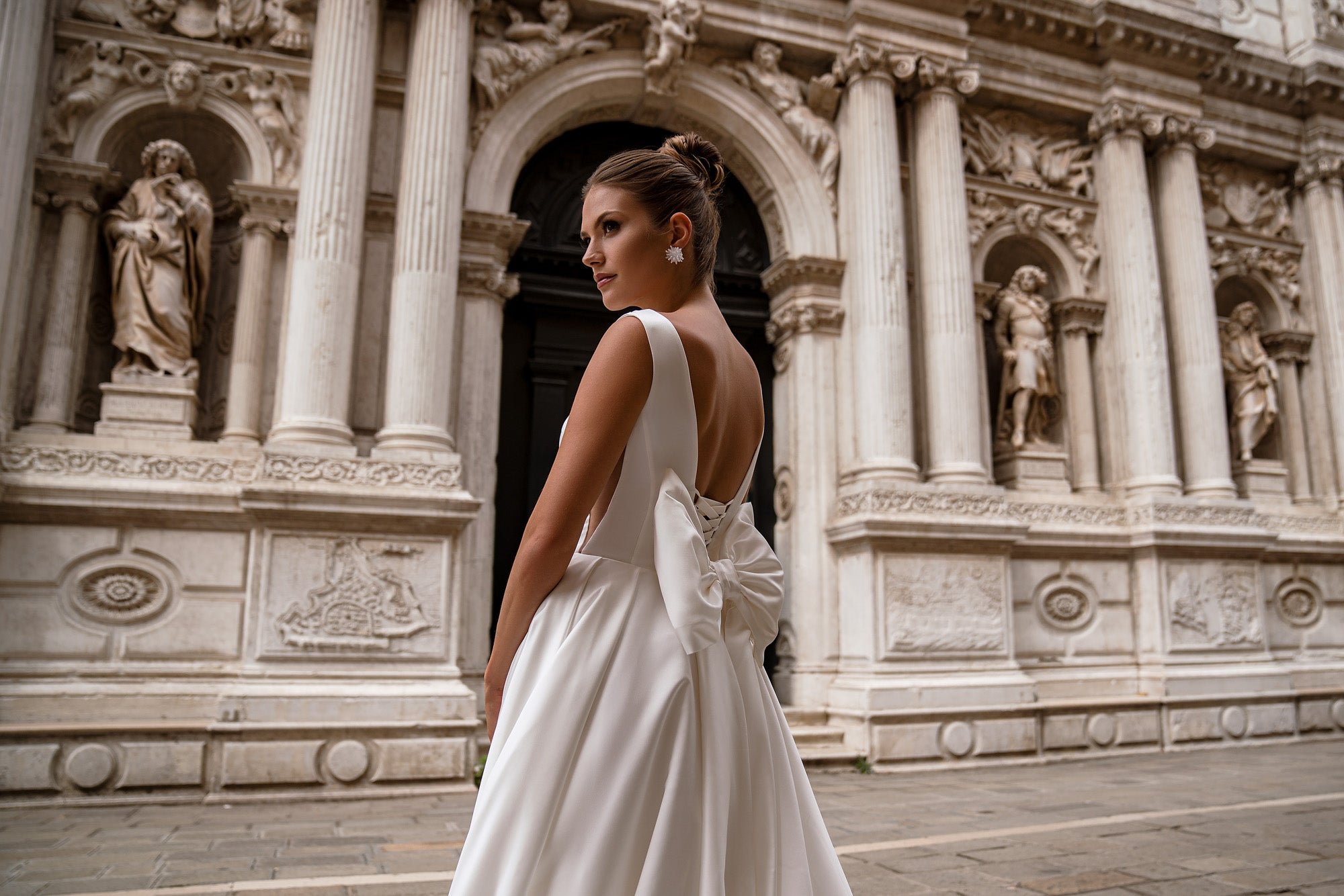 Ball Gown Wedding Dress with Deep V-Neck and Statement Bow
