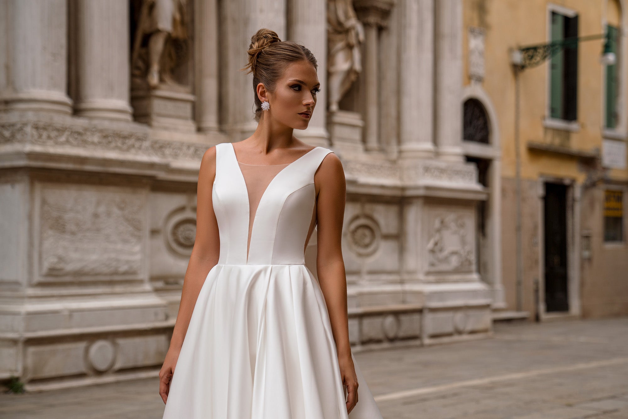 Ball Gown Wedding Dress with Deep V-Neck and Statement Bow