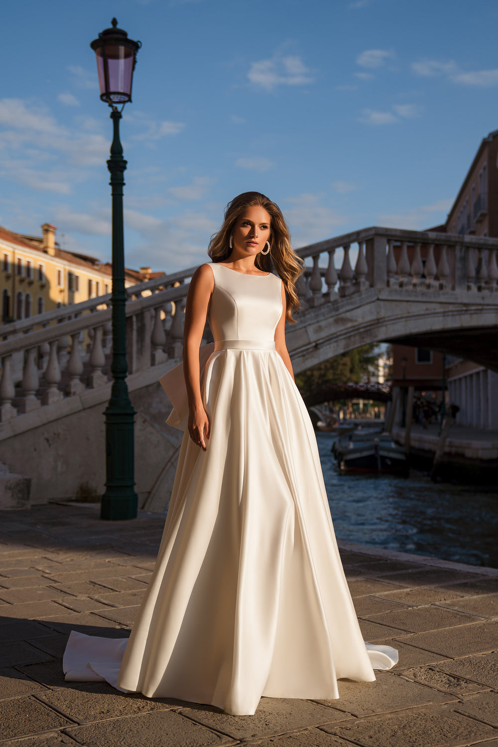 Ball Gown Wedding Dress with Boat Neckline and Statement Bow