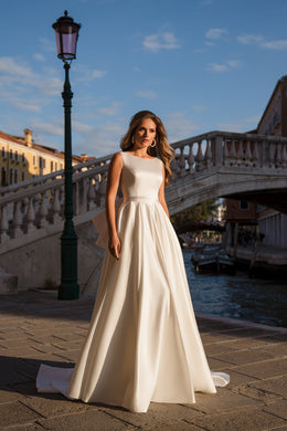 Ball Gown Wedding Dress with Boat Neckline and Statement Bow