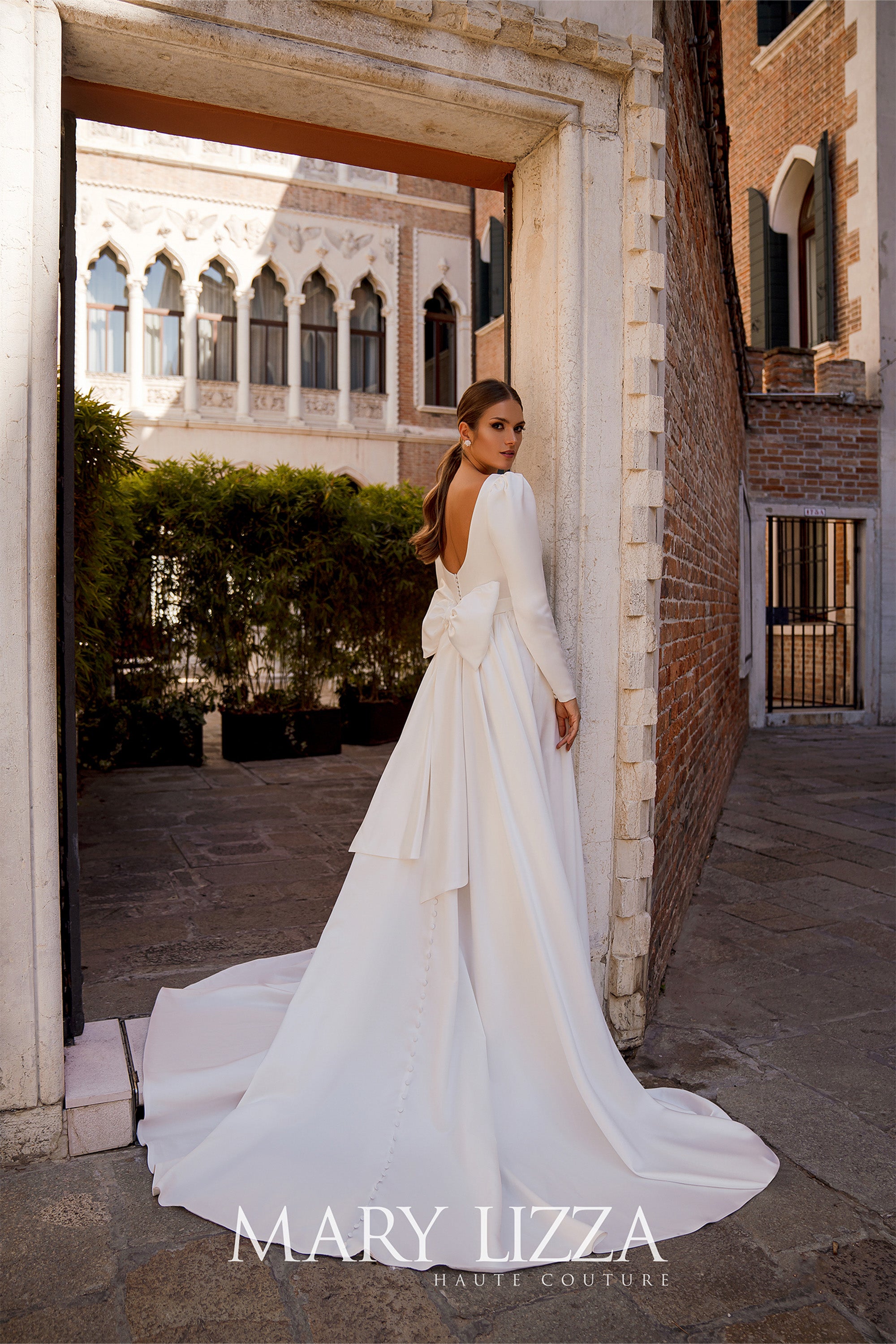 Long Sleeve Satin A-Line Wedding Dress with Open Back Bow