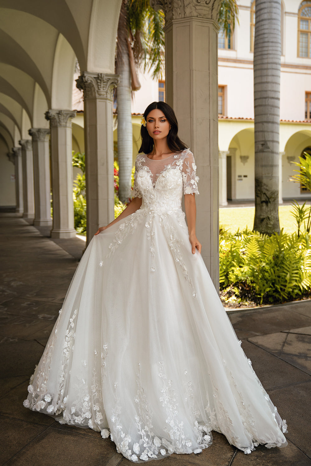 Luxurious Wedding Dress with Sleeves, Embroidered Beads, Sequined Guipure, and Voluminous Flowers