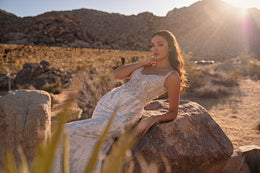 Sparkling ivory wedding dress with an embellished sweetheart bodice and fitted mermaid skirt