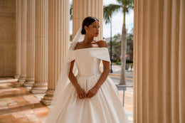 Luxury Off-the-Shoulder Ball Gown Wedding Dress with Pearl Veil