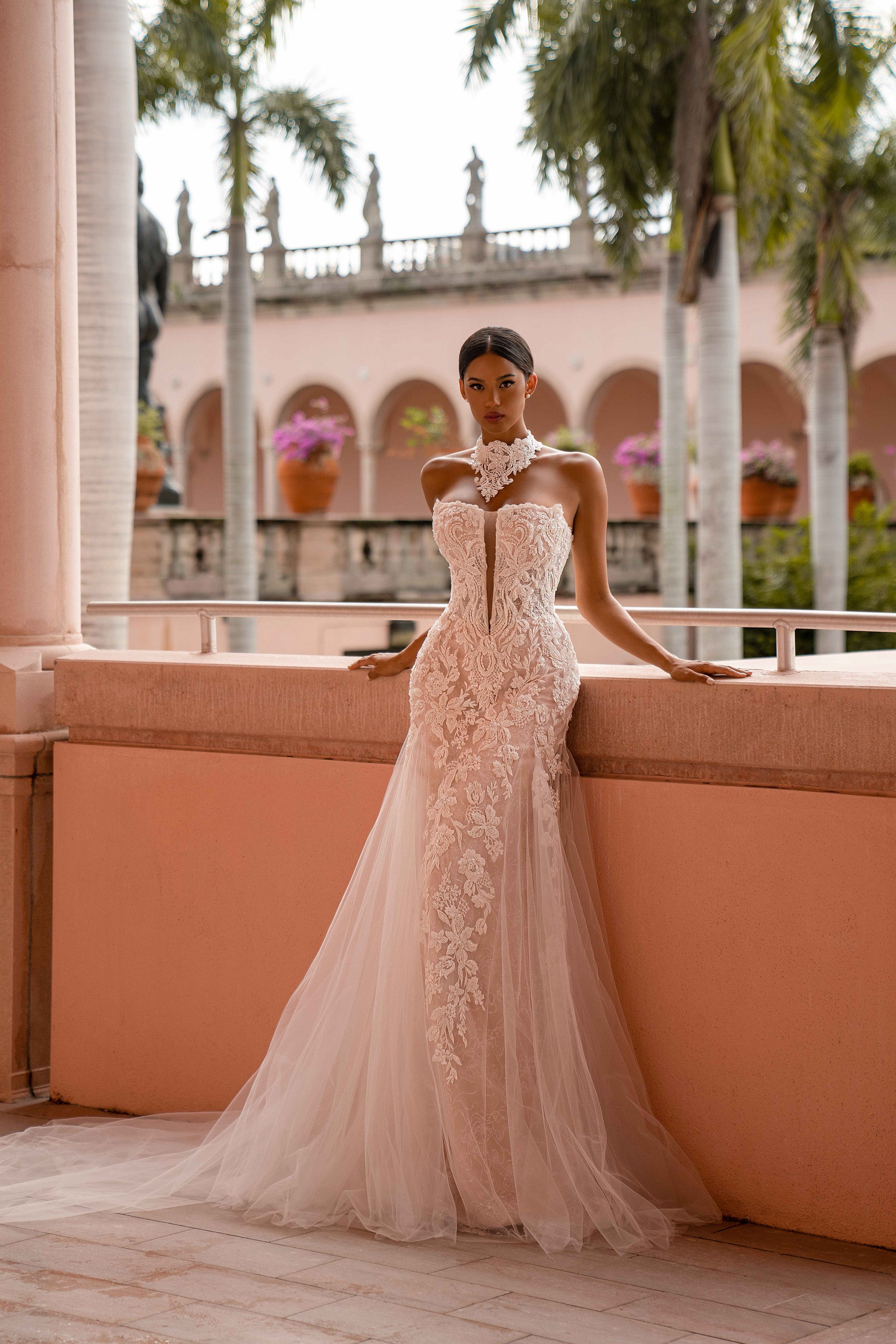 Ivory mermaid wedding dress with strapless sweetheart neckline, floral lace, and detachable high-neck collar