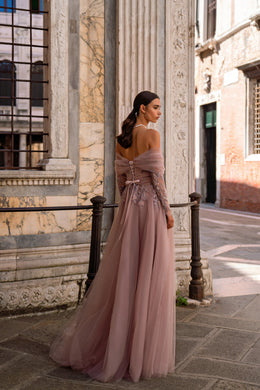 Mauve evening dress with a lace-up back, sheer off-the-shoulder sleeves, and a flowing train