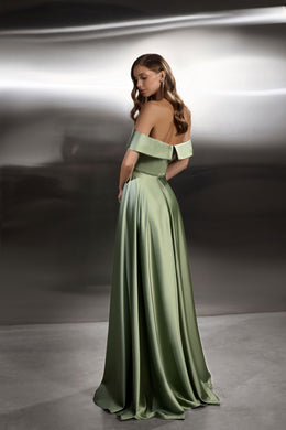 Sage green evening dress showing an open back, off-the-shoulder band, fitted waist, and long flowing skirt