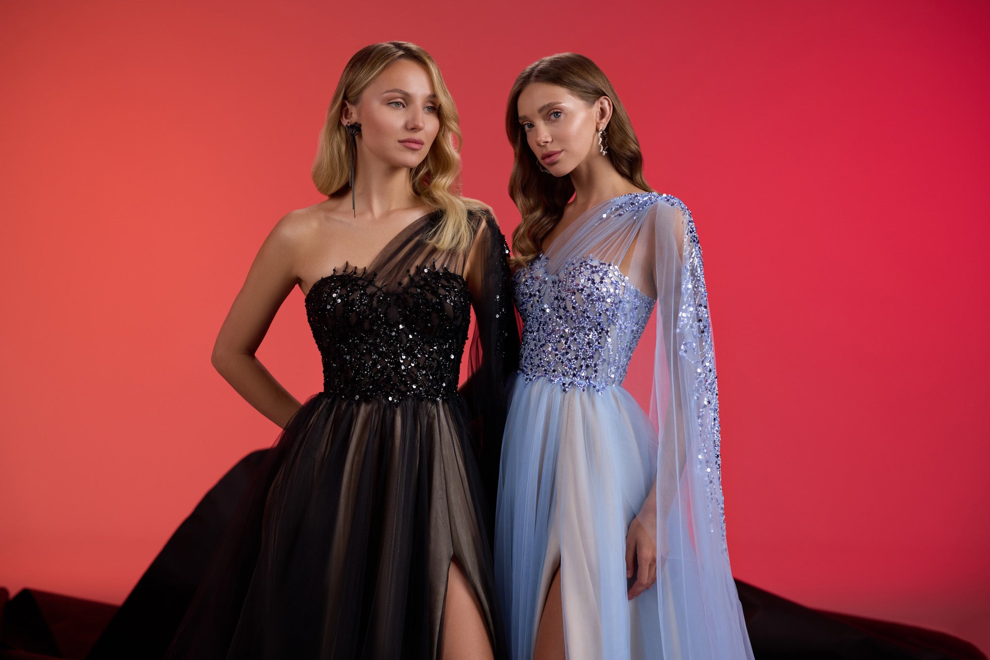 Pale blue evening dress featuring a sparkling fitted bodice, sheer cape sleeves, and flowing skirt