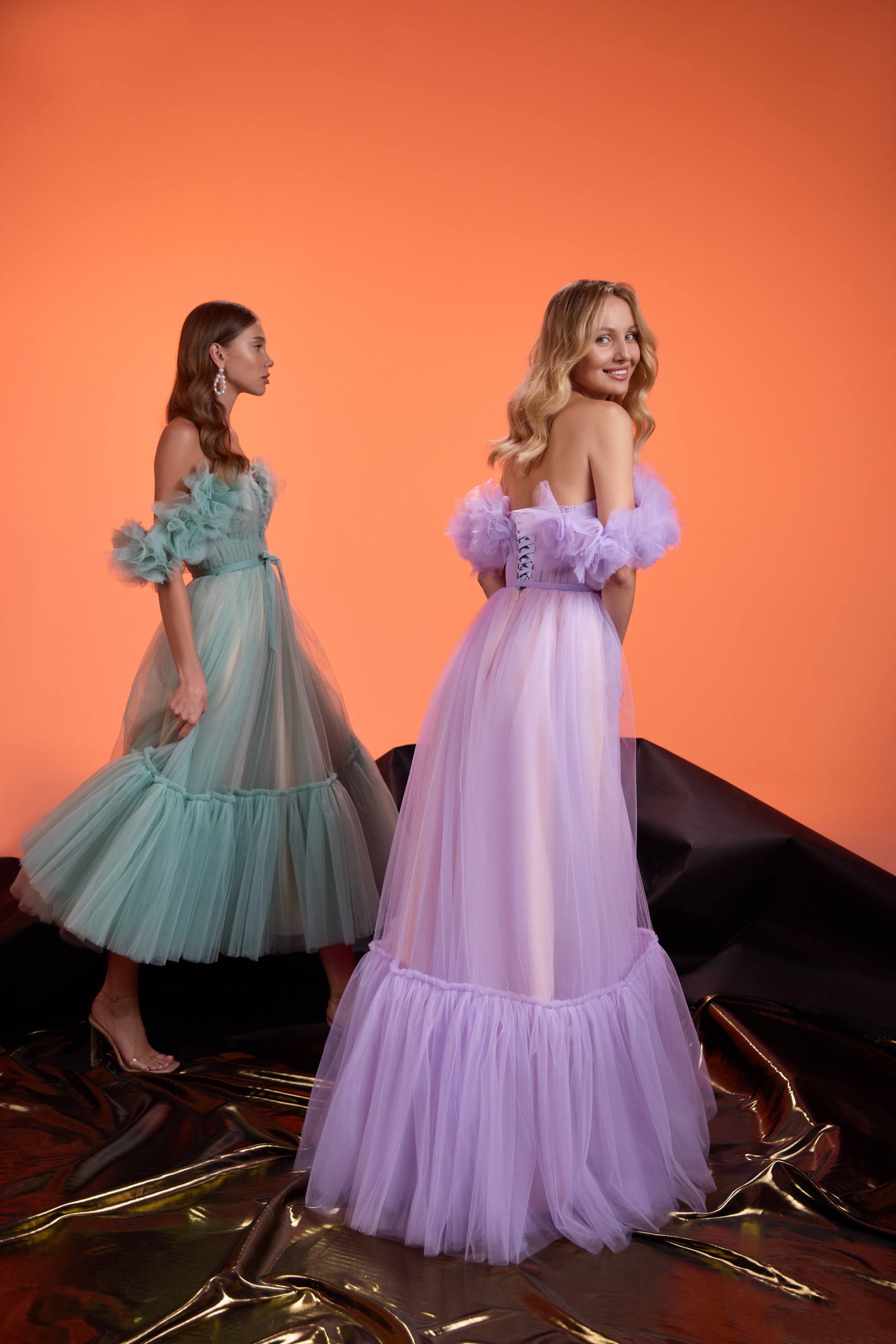 Lavender evening dress with off-shoulder ruffled sleeves, fitted waist, and a tiered tulle skirt