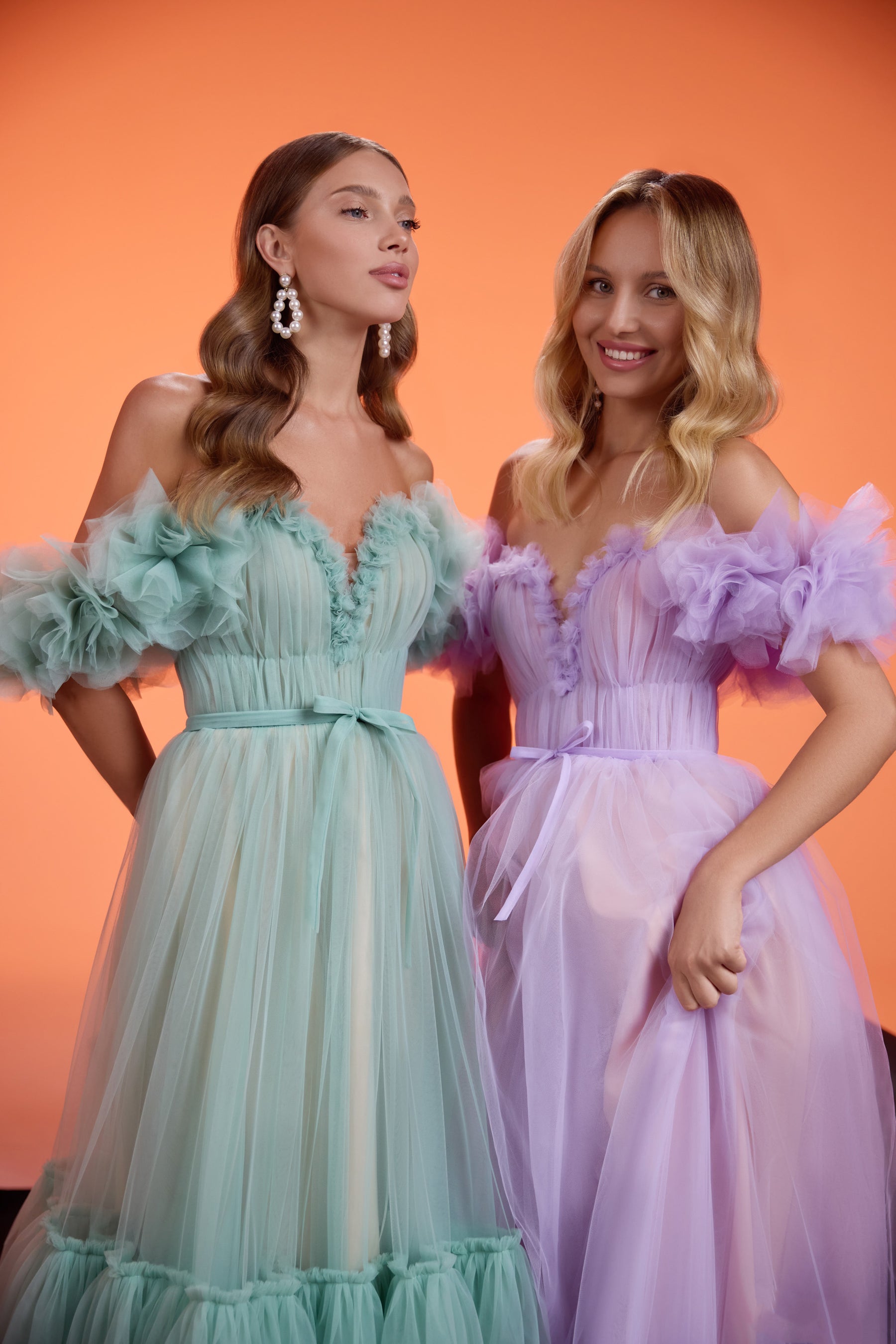 Close-up of a lavender evening dress with a ruched sweetheart neckline and ruffled off-shoulder sleeves