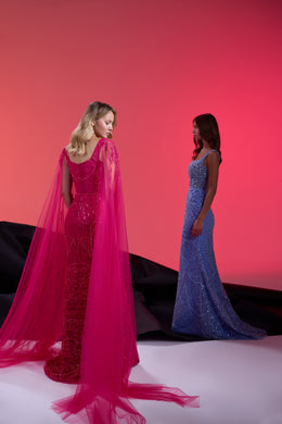 Pink sequined evening dress with a fitted mermaid silhouette and long sheer cape sleeves