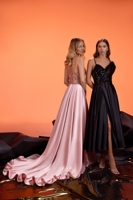 Blush pink evening dress with a sparkling open back, slim straps, satin skirt, and scalloped train