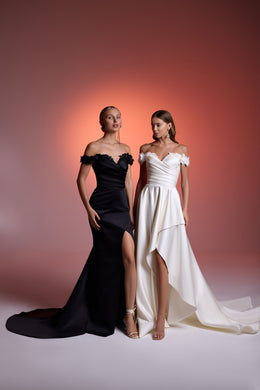 Black and white off-the-shoulder evening dresses with fitted silhouettes, thigh-high slit, and trains