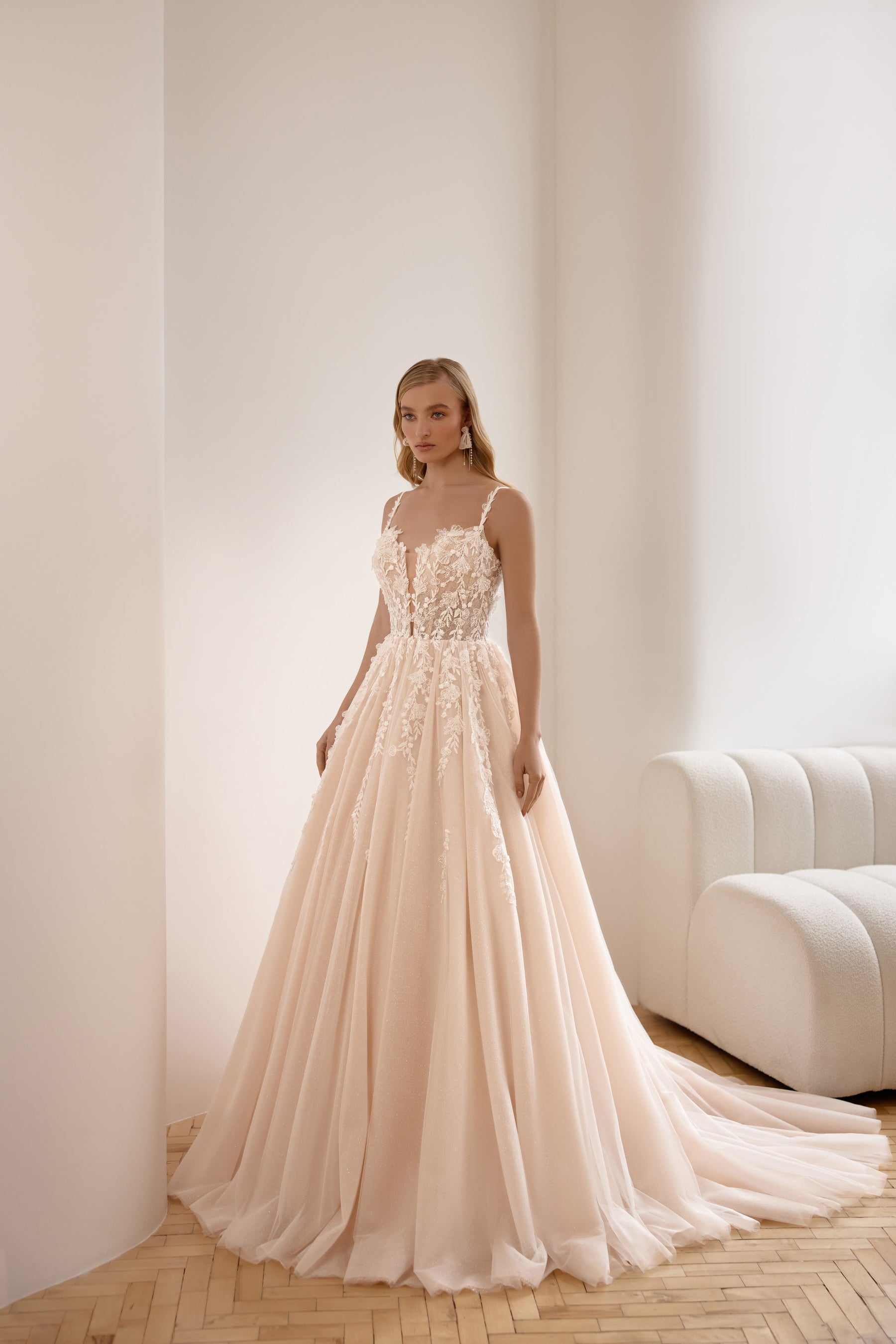 A-Line Wedding Dress with Lace Appliqués, Illusion V-Neck, Sleeveless Spaghetti Straps, Tulle Overlay and Cathedral Train