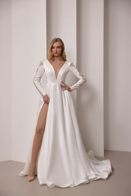 Ivory A-line wedding dress with a deep V-neckline, lace sleeves, high slit, and sweeping train