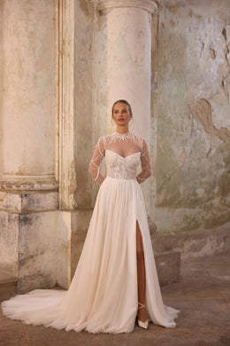 Ivory wedding dress with beaded illusion sleeves, sweetheart bodice, thigh slit, and sweeping train