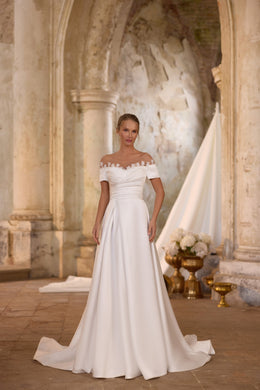 Ivory A-line wedding dress with a draped neckline, short sleeves, and a sweeping train