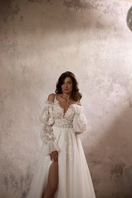 Floral lace wedding dress bodice with deep V-neckline, sheer off-shoulder sleeves, and front slit