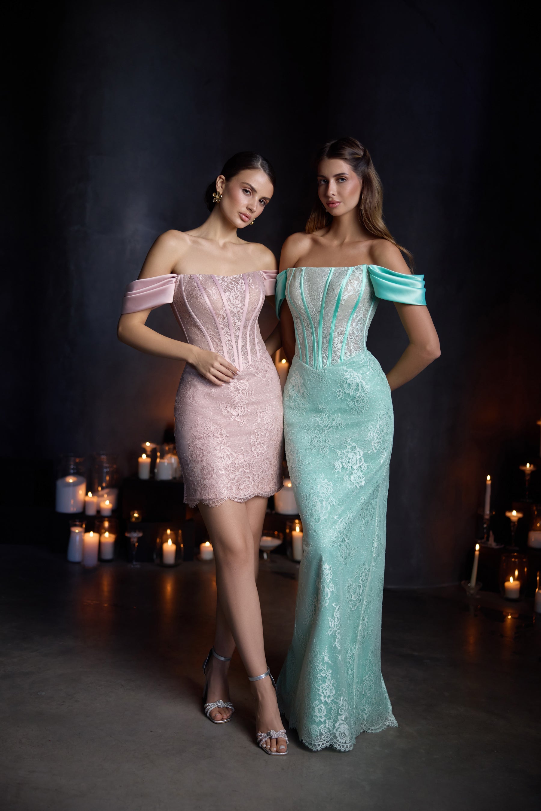 Blush pink short evening dress and turquoise fitted lace evening dress, both with off-the-shoulder sleeves