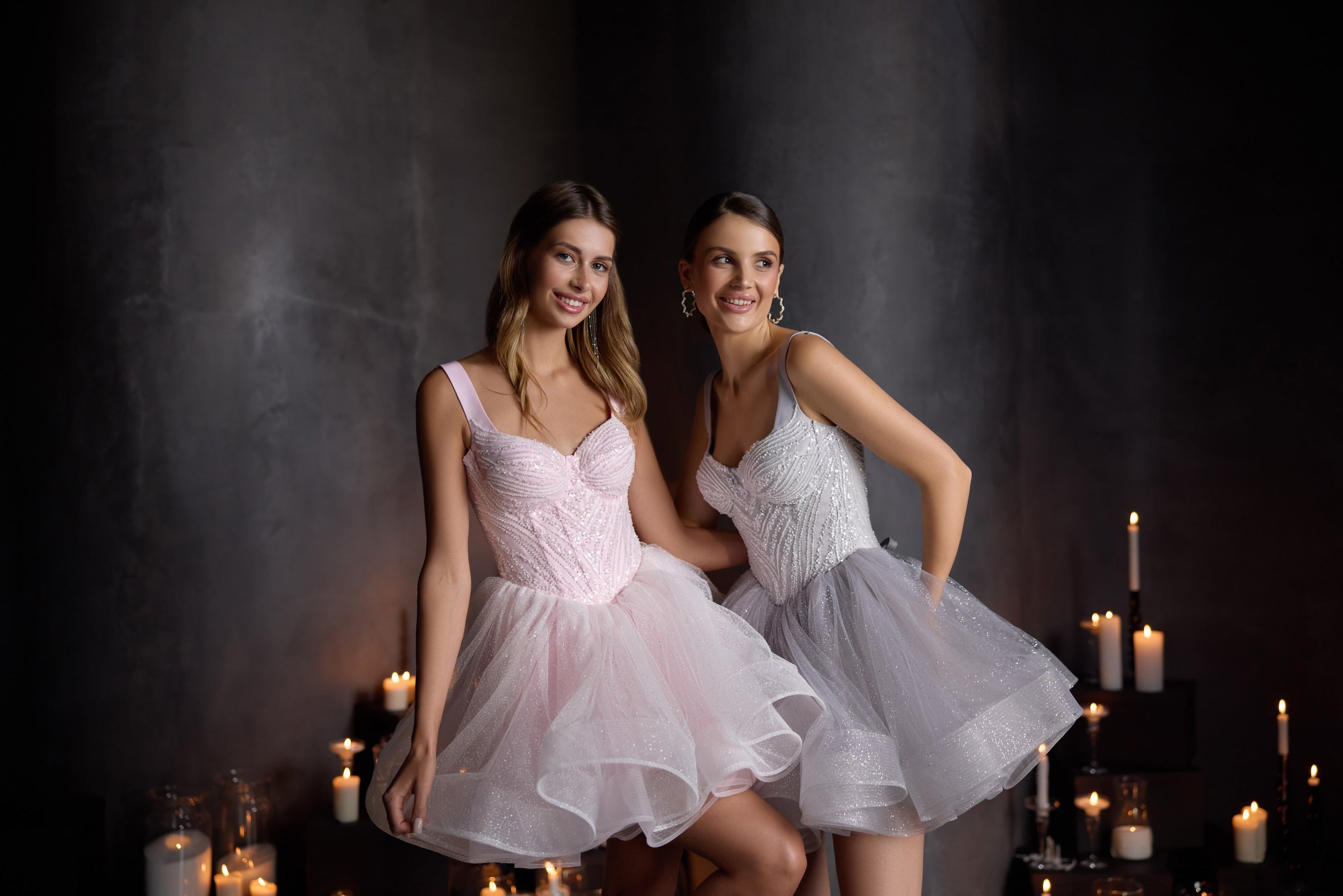 Pink evening dress featuring a sweetheart neckline, sparkling beaded bodice, and full layered skirt