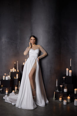 White A-line evening dress with sparkling sheer sleeves, thigh-high slit, and sweeping floor-length train