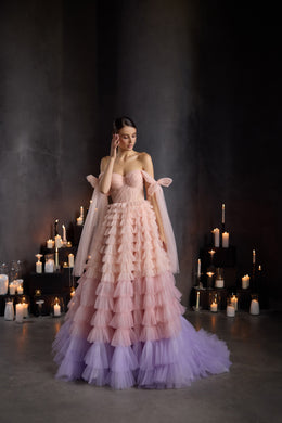 Pink-to-lavender evening dress with a sweetheart bodice, puffed off-shoulder straps, and tiered tulle ruffles