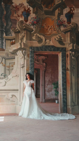 Mermaid Bridal Gown with Deep V-Neck, 3D Lace, Detachable Skirt, and Buttons Back